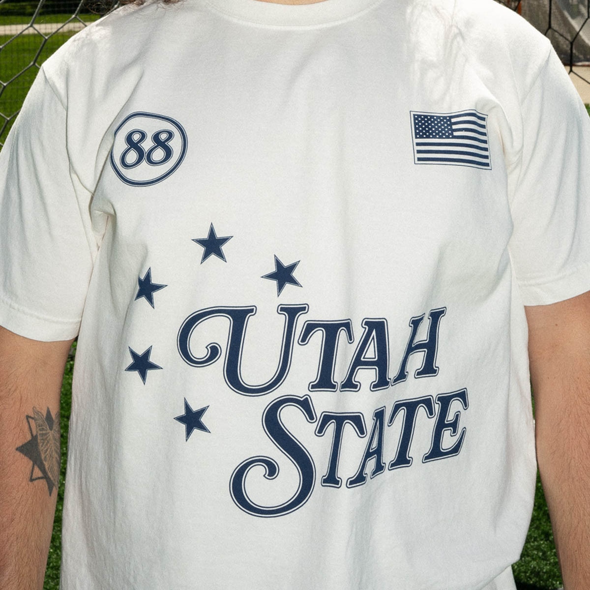 Close up of utah state jersey-inspired soccer t-shirt